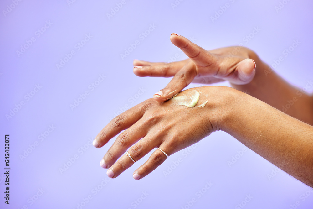 Hands, dry skin and woman with cream for studio skincare, cosmetics or wellness on purple background