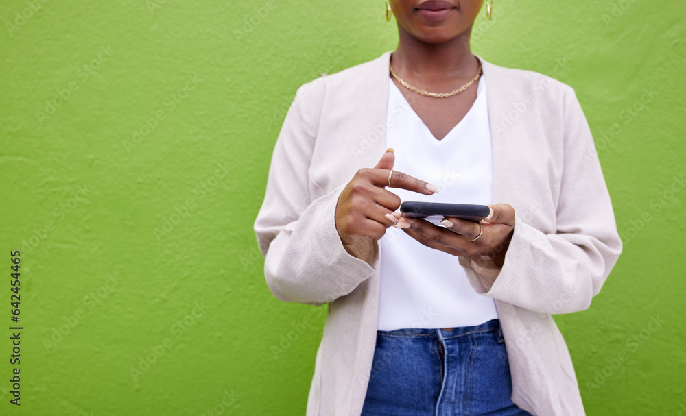 Hands, internet and phone for communication by a wall or green background for connection. Closeup of