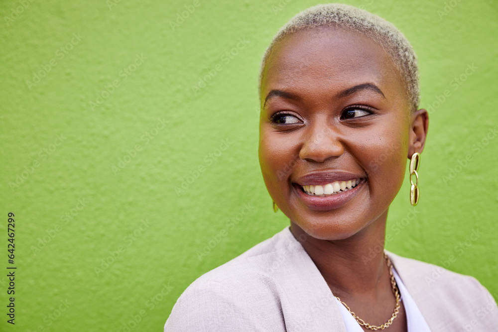 Smile, face and young black woman by a green wall with trendy, classy and elegant jewelry and outfit