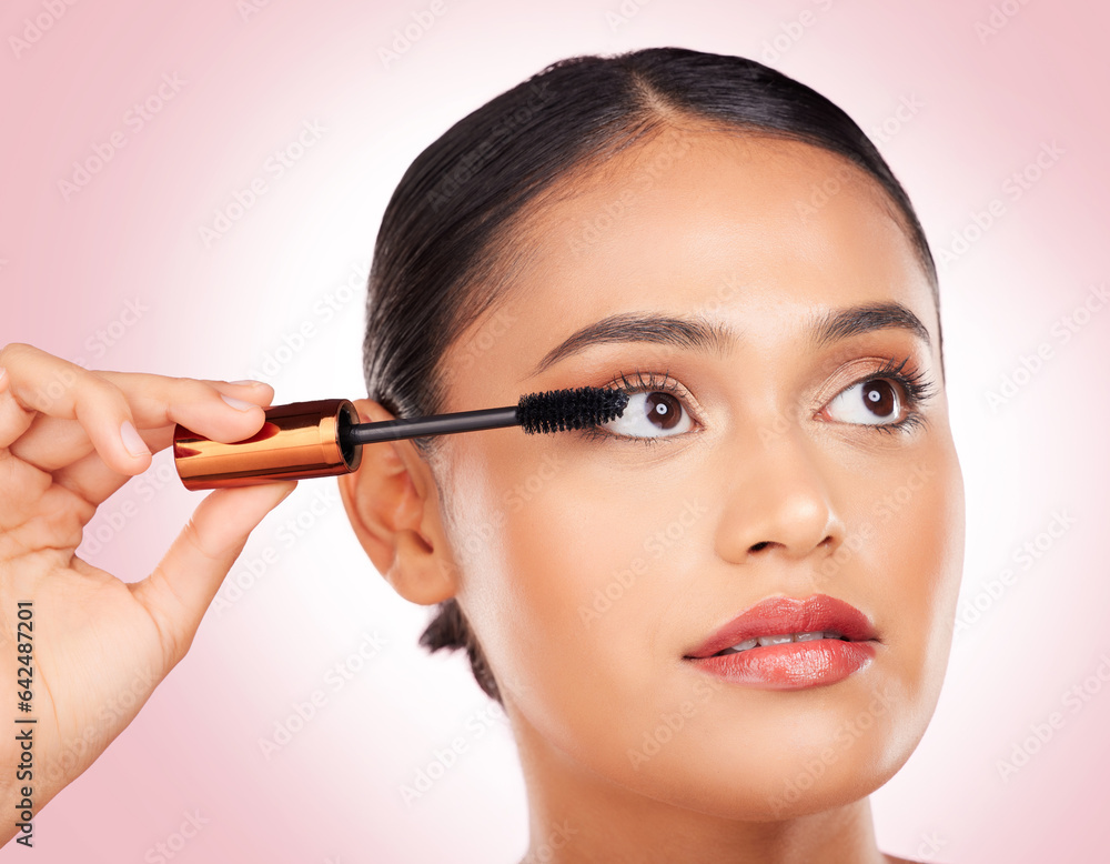 Makeup, woman and mascara for beauty and skincare, cosmetics and eyelash extension in studio on pink