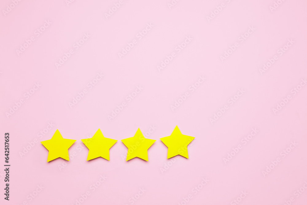 Four stars on pink background. Customer experience concept