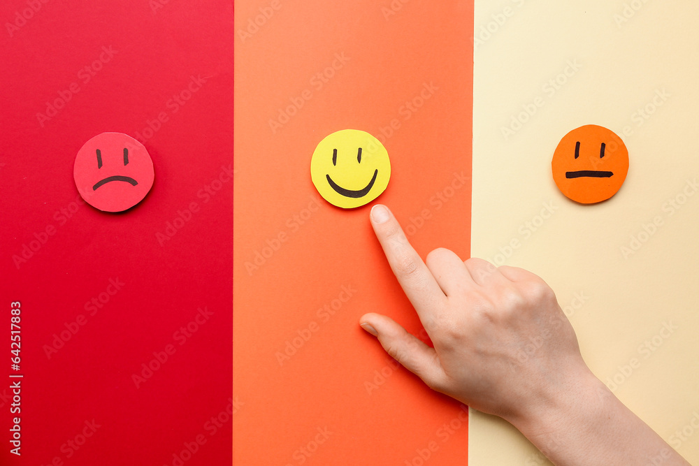 Woman pointing at happy smile on color background. Customer experience concept