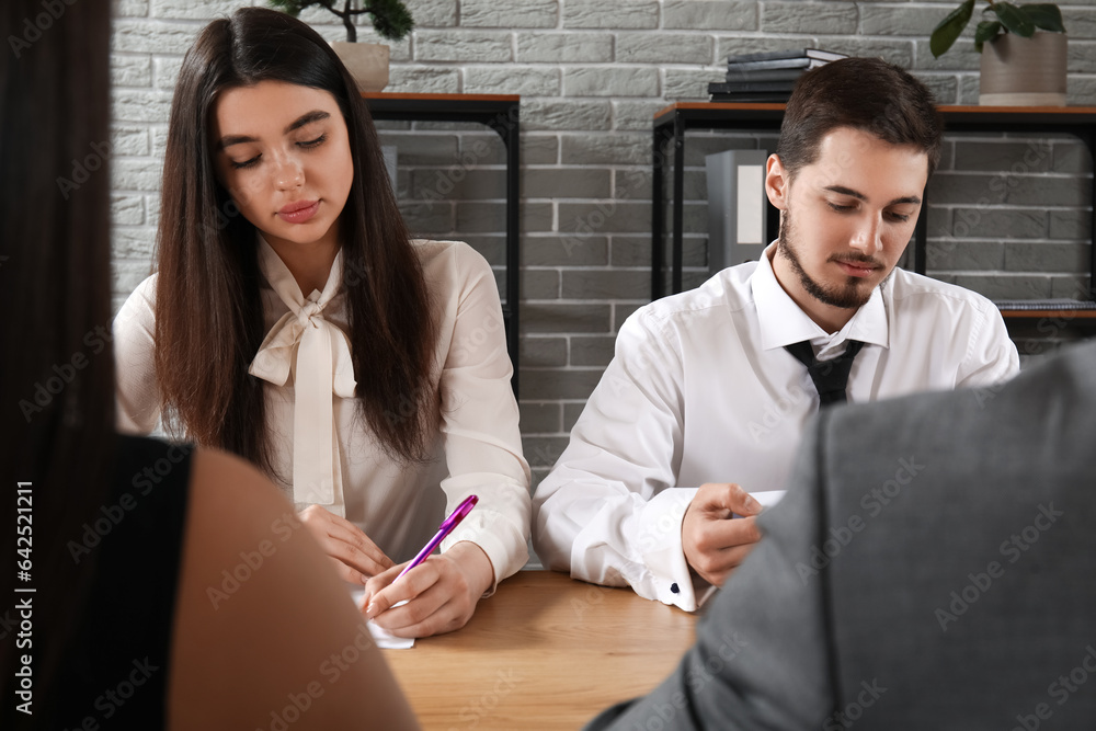 Human resources commission interviewing applicants in office