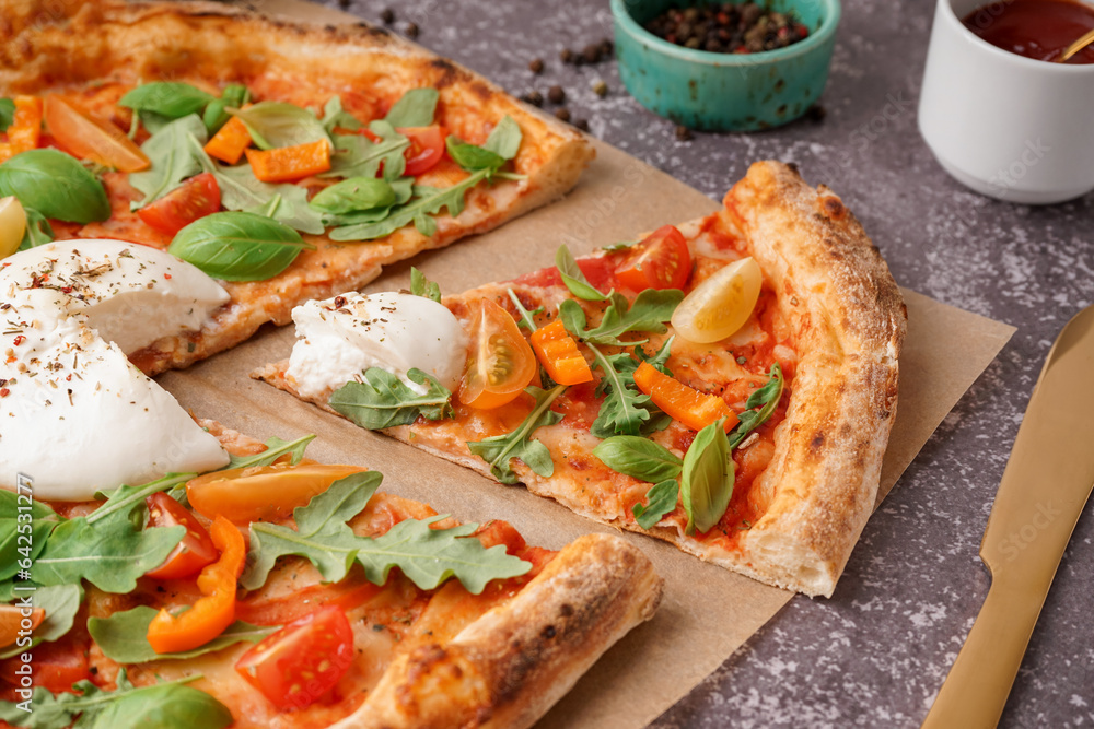 Tasty pizza with Burrata cheese on grey background