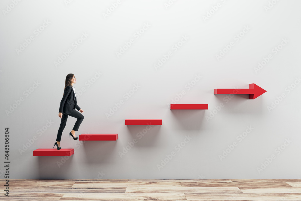 Side view of young business woman climbing red arrow stairs to success on concrete wall background i