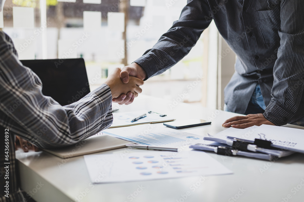 Business meeting, businessman shaking hands in business partnership meeting, business cooperation.