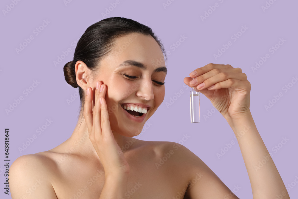 Beautiful young woman with ampule on lilac background, closeup