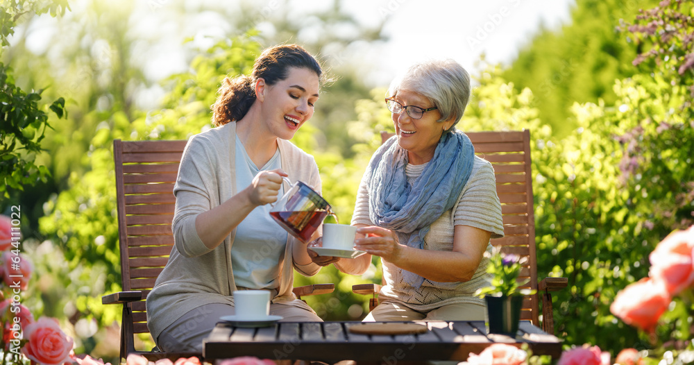 women drinking tea in the garden