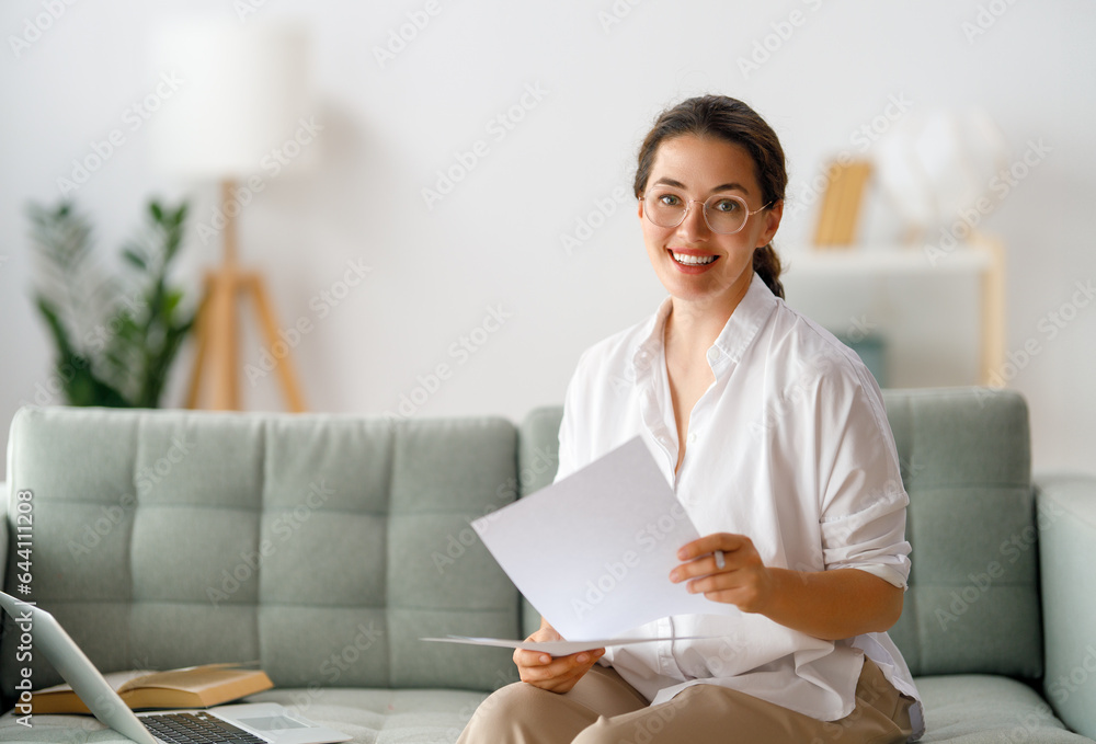 woman working on laptop at home