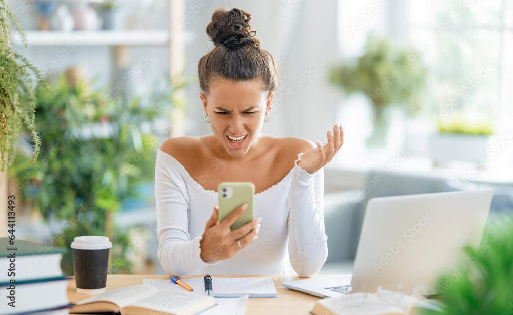 woman working on laptop at home