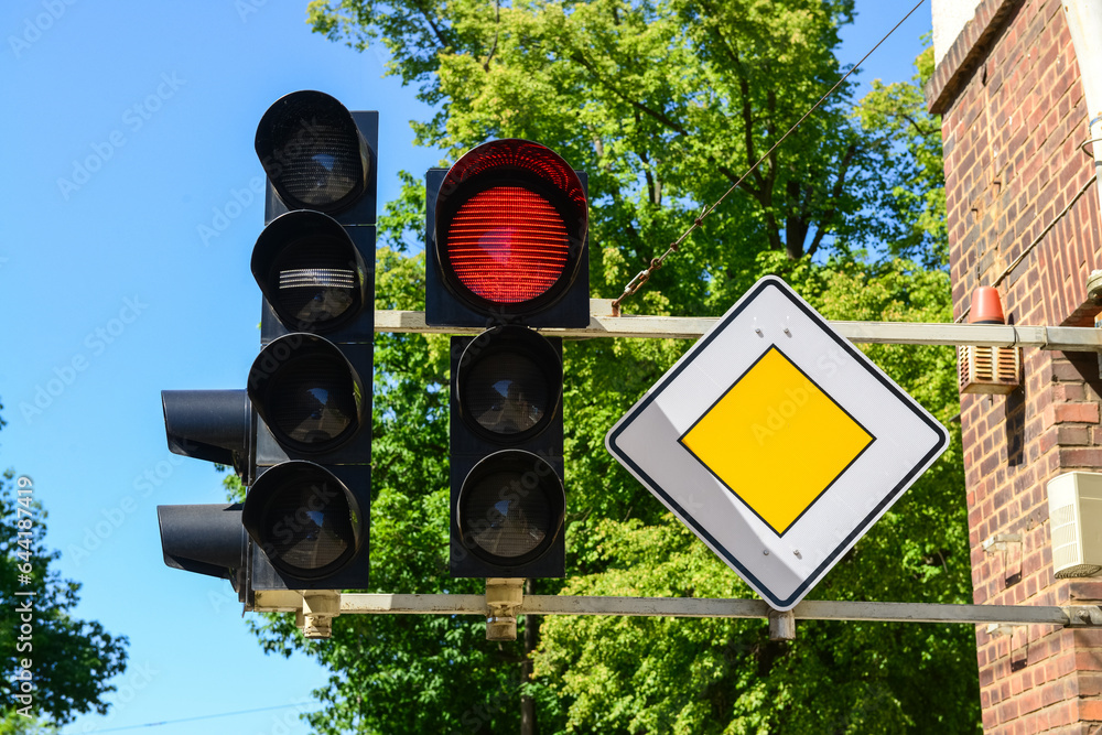 View of red traffic light in city, closeup