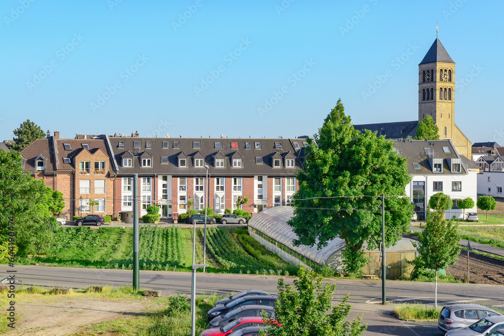 View of beautiful buildings with greenhouse in city