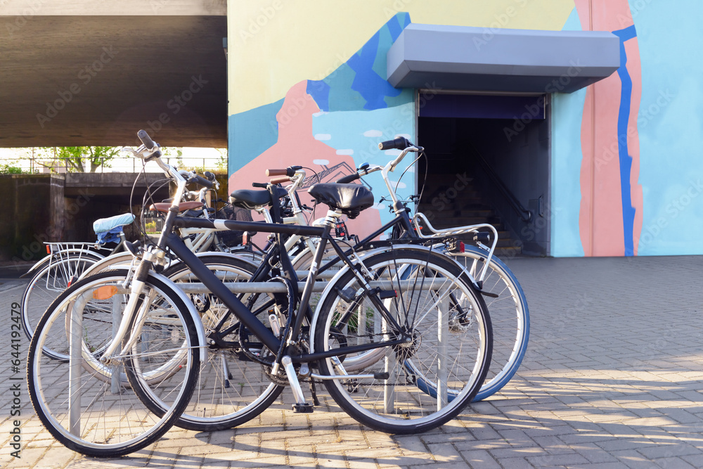 Modern bicycles parked on city street