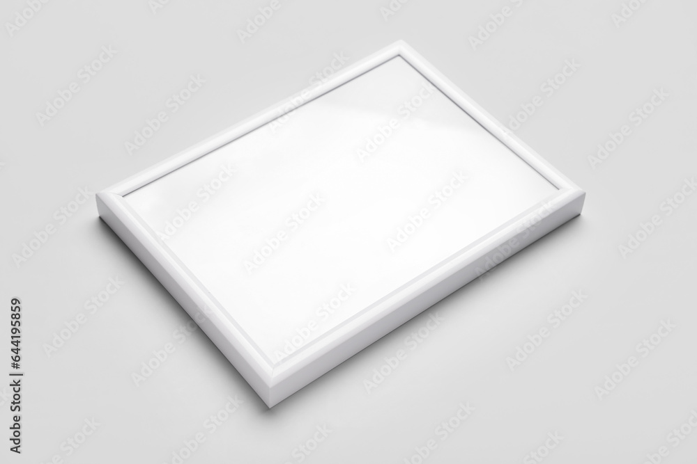 Blank picture frame on light background