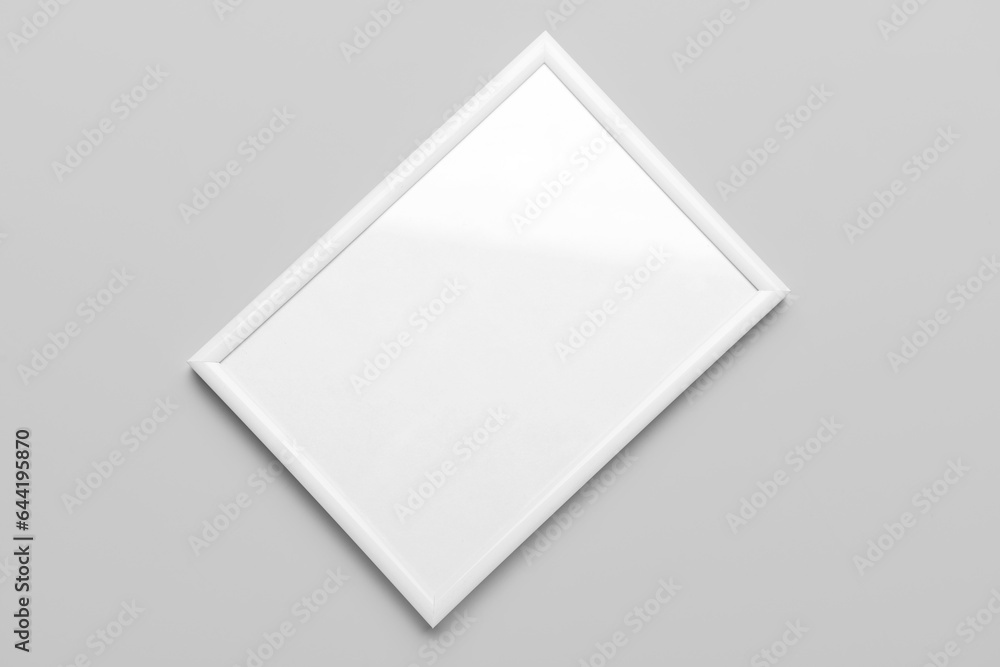 Blank picture frame on light background