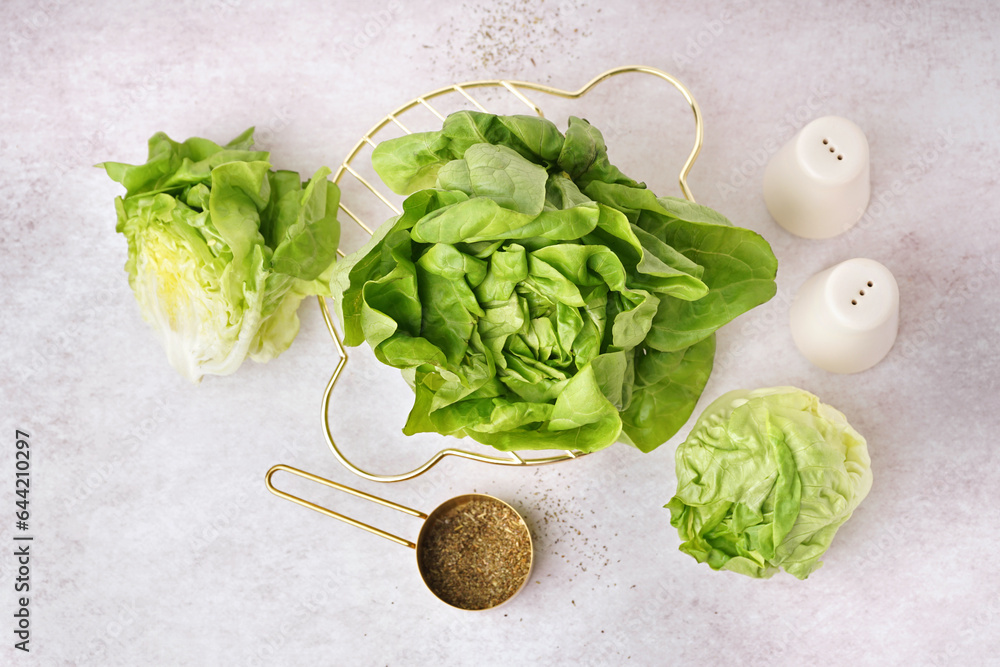 Grid with fresh Boston lettuce on white background