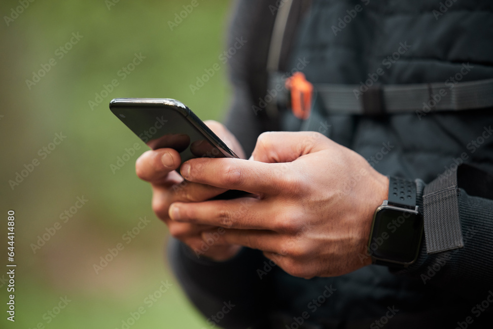 Closeup, man or athlete with a smartphone, typing or social media with mobile user, tracking progres