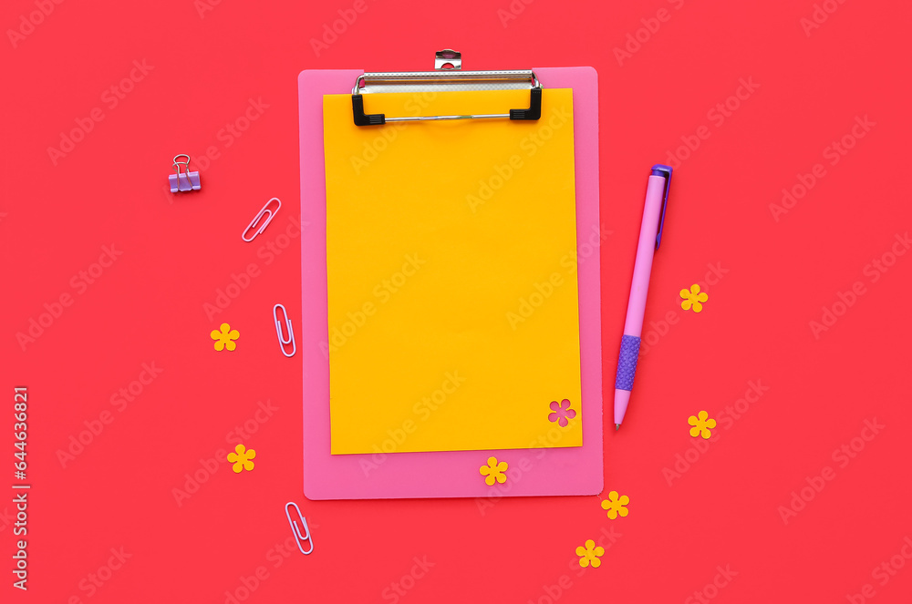 Composition with clipboard, blank sheet of paper and stationery on color background