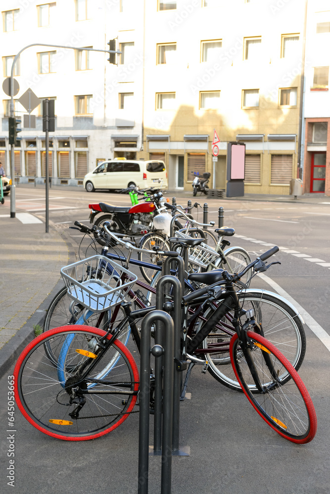 Modern bicycles parked on city street