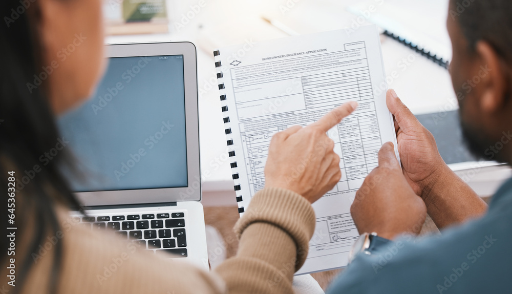 Hands, insurance documents and couple reading with laptop, pointing and financial decision in home. 