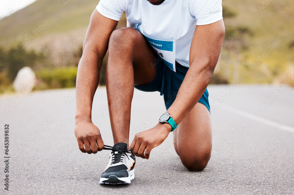 Road, fitness and hands of man with shoes tie for running, training or race preparation outdoor zoom