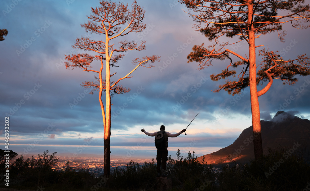 Dark, morning and person on the mountain for hiking, fitness or trekking for vacation. Back, nature 