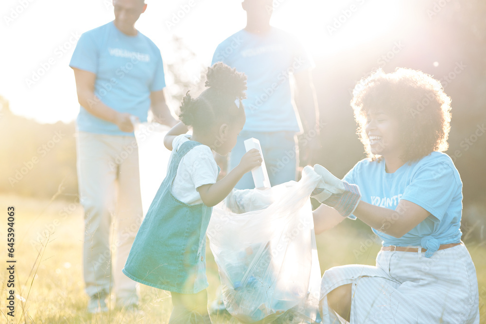 Nature activist, volunteering family and child cleaning garbage pollution, trash litter and throw bo