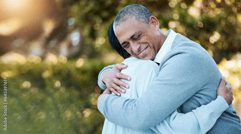 Love, nature and senior couple hugging in park for care, romance or comfort on an outdoor date. Smil