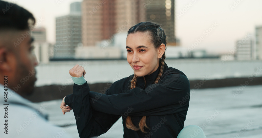 Fitness, personal trainer and stretching on rooftop in city for exercise, sport or outdoor workout. 