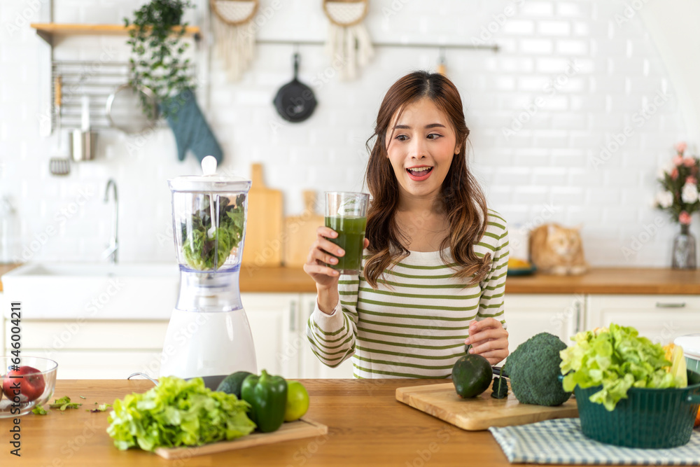 Portrait of beauty healthy asian woman making green vegetables detox cleanse and green fruit smoothi