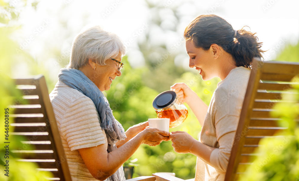 women drinking tea in the garden