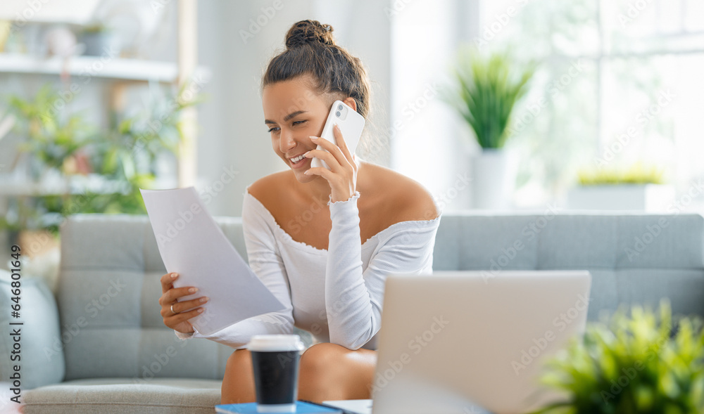 woman working on laptop at home