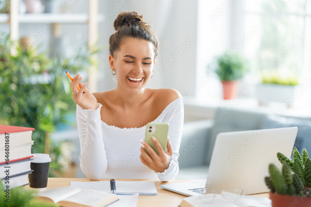 woman working on laptop at home