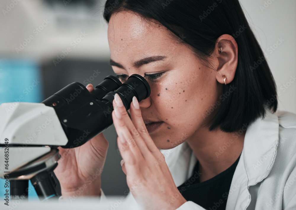 Science, microscope and Asian woman in laboratory for sample, data analysis and study. Biotechnology