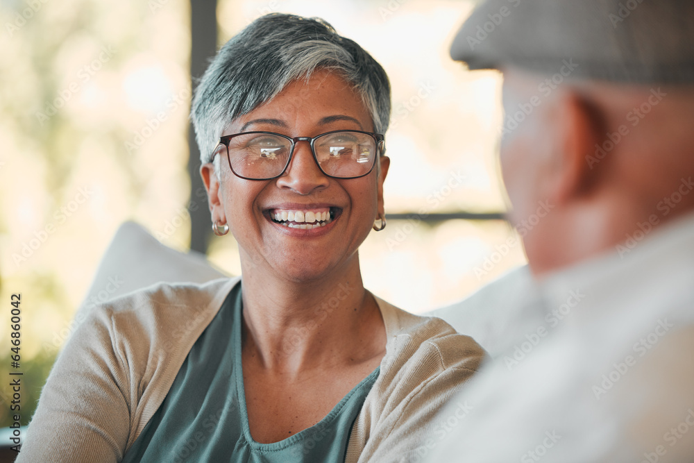 Conversation, smile and senior couple on a sofa for relaxing, communication or bonding together. Hap