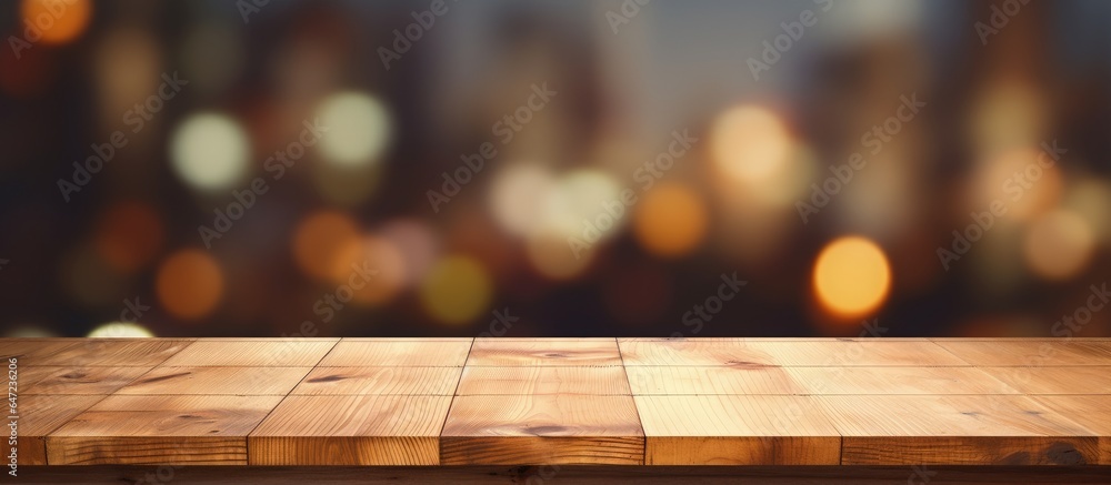 Blank wooden table and blurry background for product showcase design