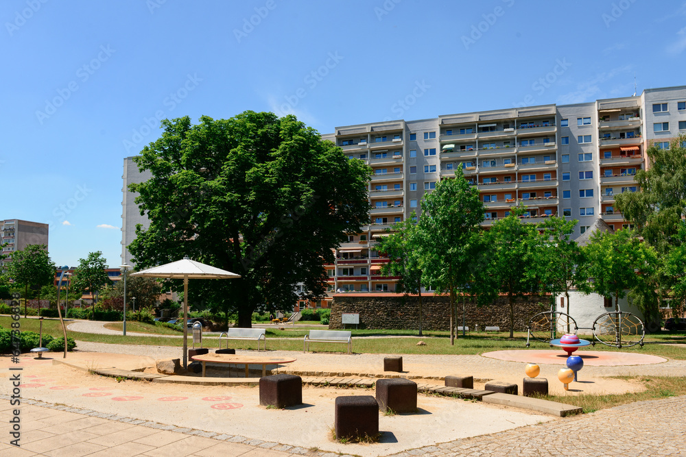 View of playground and multi-storey residential building