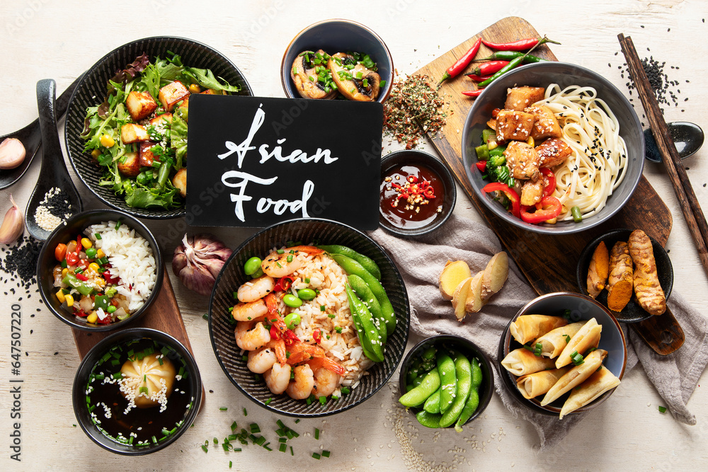 Asian food background with various ingredients on white background , top view.