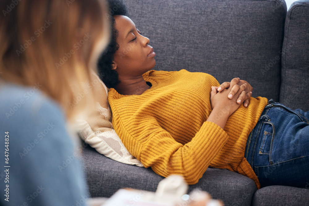 Anxiety, depression and psychology with a black woman in therapy, talking to a professional. Mental 