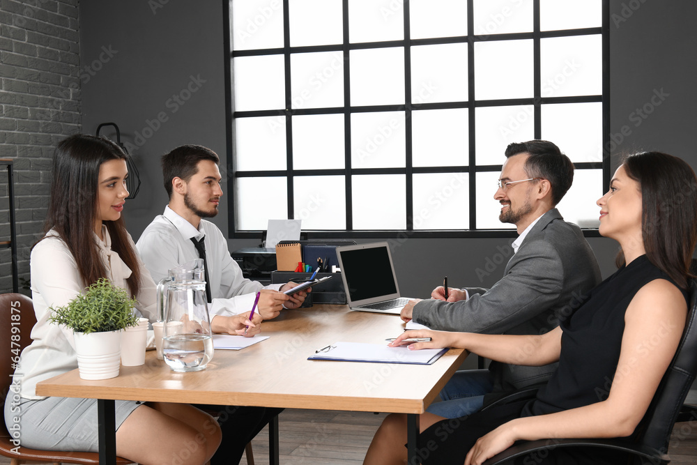 Human resources commission interviewing applicants in office