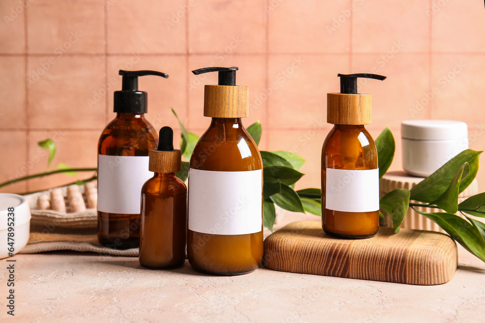 Different bottles of shampoo on table