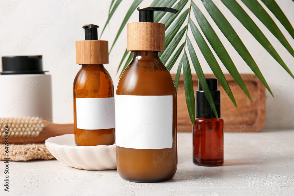 Bottles of shampoo on white background