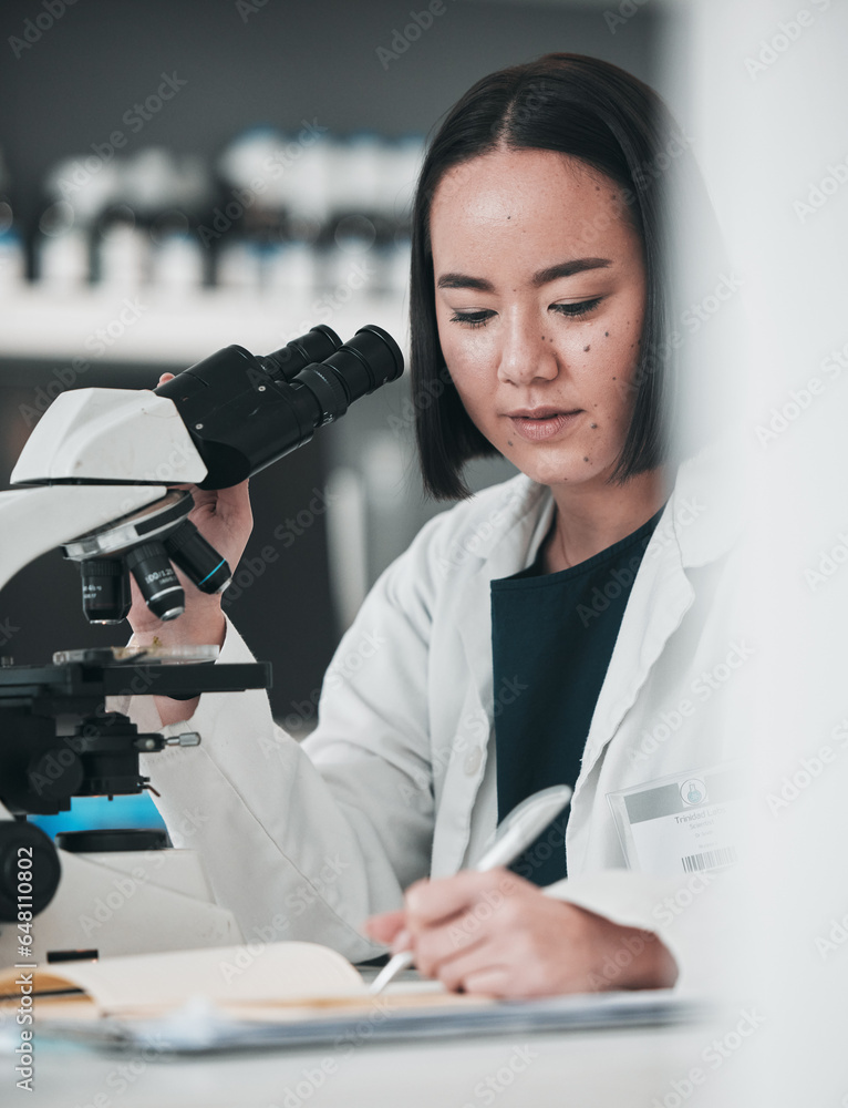 Microscope, asian woman and writing in laboratory for science development, planning analysis and research notes. Scientist, biotechnology and lens to review investigation, test report and dna results