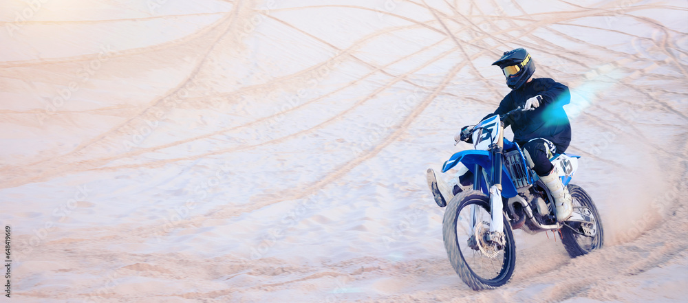 Fitness, desert and athlete on motorbike for action, adrenaline and skill training for challenge, Sports, sand dunes and man biker practicing for race, competition or performance adventure at a rally