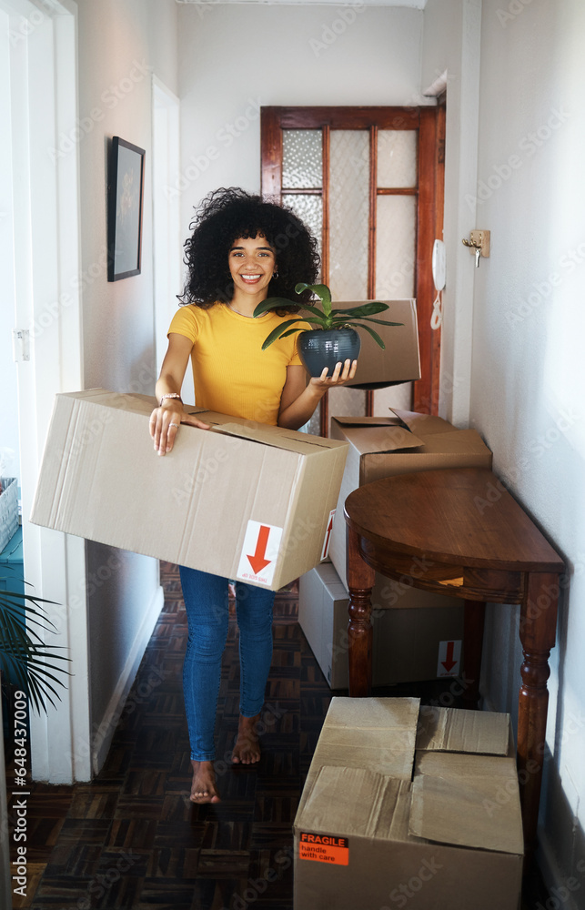 Portrait, new home and woman moving box, plant and smile in apartment. Real estate, happy person with boxes and pot for packing in cardboard or unboxing for property relocation in hallway of house