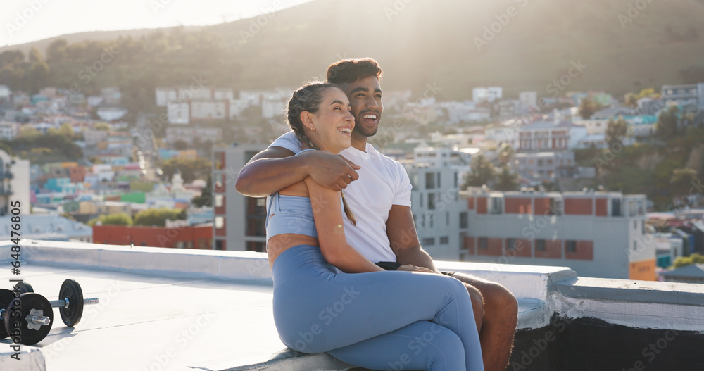 Fitness, couple and city to rest for exercise, workout or training together on a building rooftop. Happy man and woman on sports outdoor break with smile, communication or conversation in Cape Town