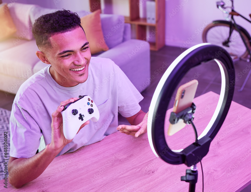 Review, live streaming and man gamer talking of console controller on social media for connection on vlog. Ring light, influencer and content creator or person speaking on internet show as host