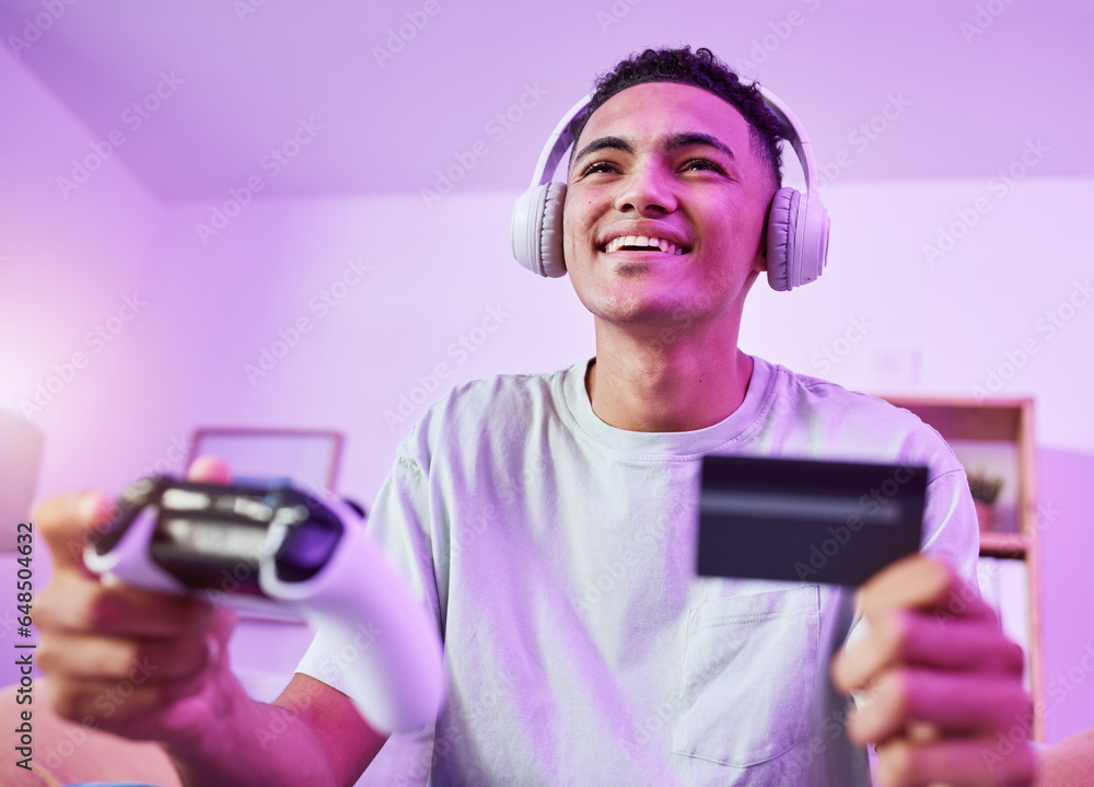 Headphones, credit card and man playing video game ecommerce for purchase with controller in virtual challenge. Internet, user experience and person or esport gamer streaming sports games online