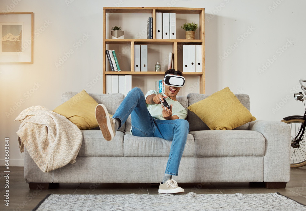 Virtual reality glasses, excited and man with game, futuristic and metaverse with connection, smile and relax. Person, gamer or guy on a couch, VR eyewear and home with online playing and controller