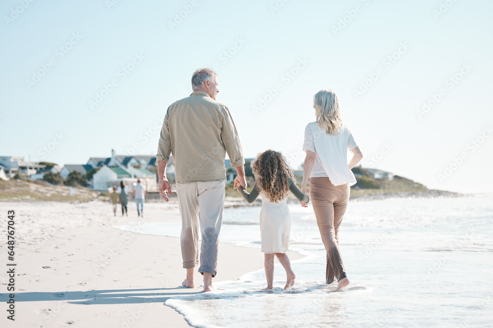 Relax, holding hands and grandparents with child at beach for travel, love and support. Summer vacation, care and retirement with family walking on seaside holiday for adventure, bonding and peace